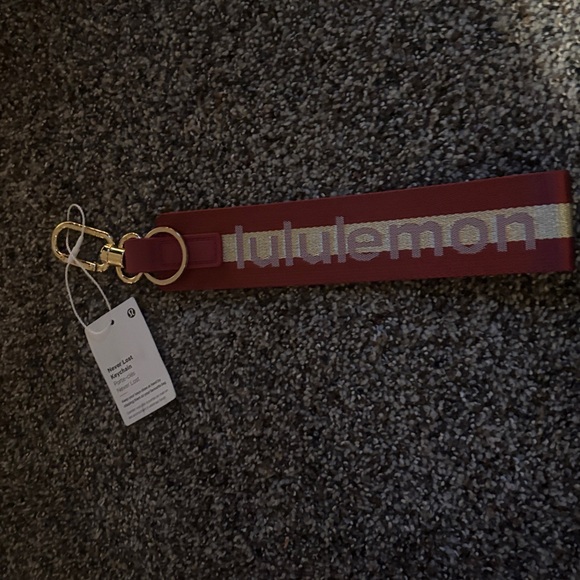 lululemon athletica Accessories - lululemon athletica red and gold never lost Keychain